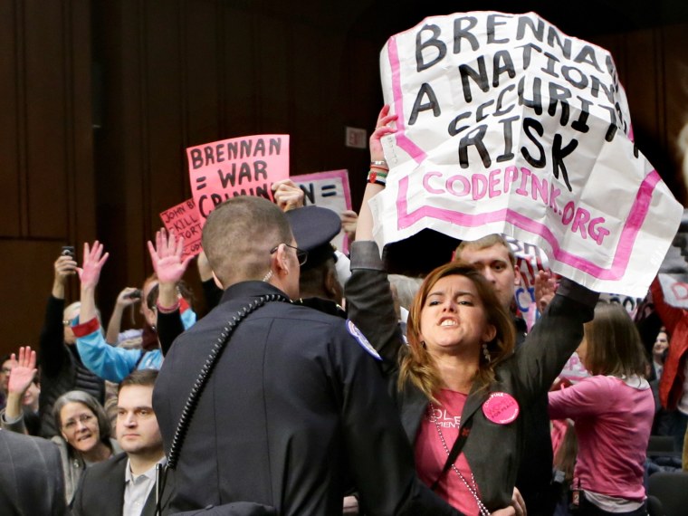 Protesters from CODEPINK, a social justice group opposed to U.S. funded wars, disrupt the start of a Senate Intelligence Committee's confirmation hearing for John Brennan, the top White House adviser on counterterrorism and nominee to lead the Central...