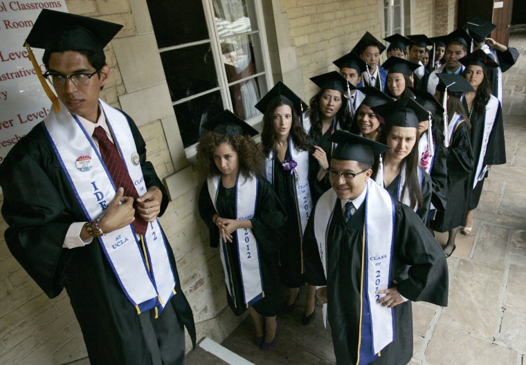 Image: Undocumented UCLA students attend graduation ceremony at a church near the campus in Los Angeles