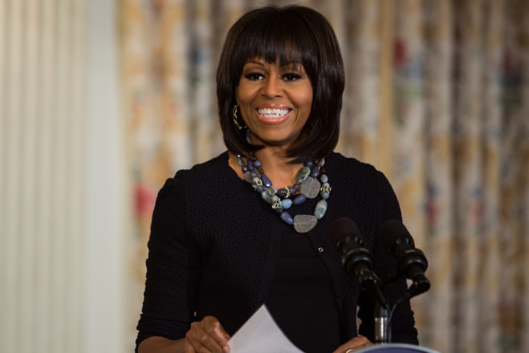First Lady Michelle Obama delivers opening remarks during a workshop for high school students with the cast and crew of the film \"Beast of the Southern Wild,\" in the State Dining Room of the White House, in Washington, Wednesday, Feb. 13, 2013. Photo...