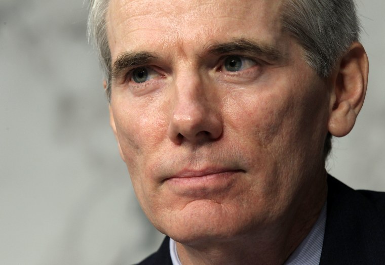 U.S. Sen. Rob Portman, R-Ohio, announced on March 14, 2013 that he has reversed his stance against same-sex marriage because his son, Will Portman, is gay. WASHINGTON, DC - SEPTEMBER 13:  U.S. Sen. Rob Portman (R-OH) listens during a hearing before the...