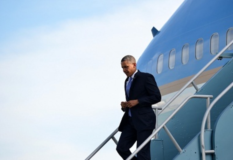 President Obama disembarks from Air Force One at San Francisco International Airport in San Francisco, California, on April 3, 2013. (Photo by Jewel Samad/AFP/Getty Images)