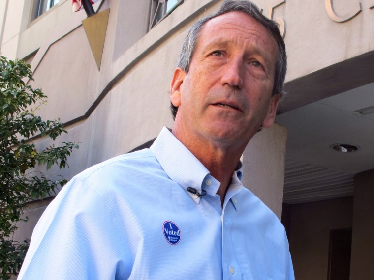 Former South Carolina Gov. Mark Sanford answers questions from reporters after voting in Charleston, S.C., on Tuesday, April 2, 2013. (AP Photo/Bruce Smith)
