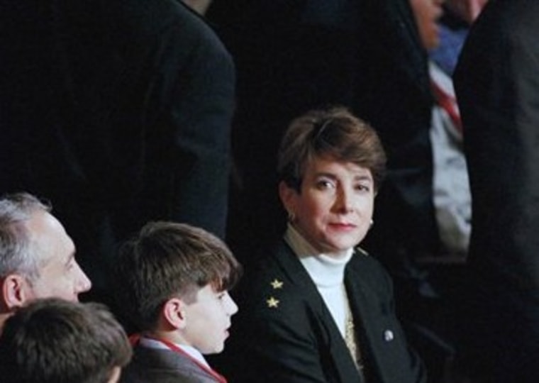 File photo of then -newly sworn-in Rep. Marjorie Margolies Mezvinsky, D-Pa. along with her family, take part in the opening session of the 103rd Congress on Capital Hill in Washington on Tuesday, Jan. 5, 1993. (AP Photo/Marcy Nighswander)