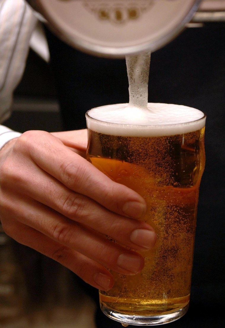 Beer prices rise on VAT hike.File photo dated 19/03/07 of a bartender pouring a pint of lager as the VAT hike will lead to the typical cost of a pint of beer in a pub breaking through the &pound;3 barrier for the first time. Issue date: Tuesday January...