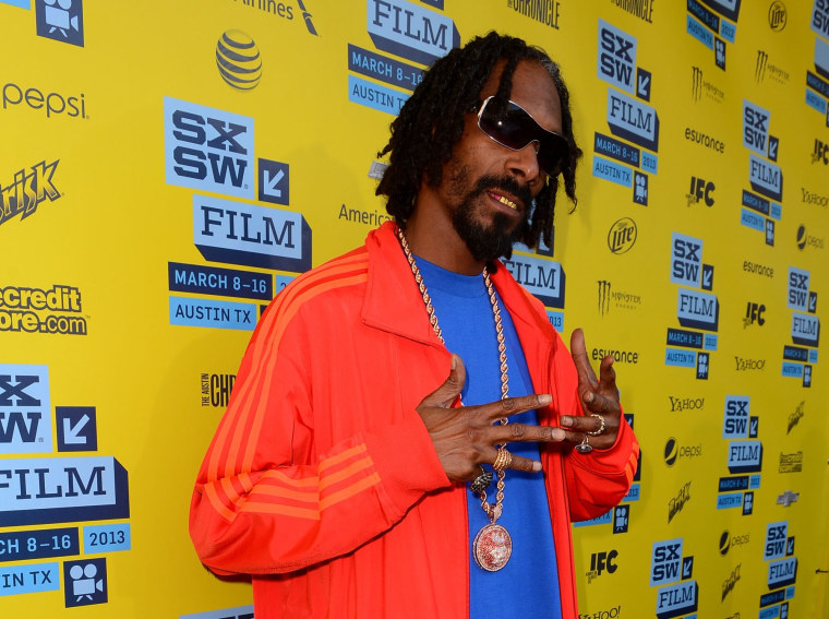 AUSTIN, TX - MARCH 14:  Rap and Reggae artist Snoop Lion attends the 'Reincarnated' Red Carpet Arrivals at the  2013 SXSW Music, Film + Interactive Festival held at the Paramount Theatre on March 14, 2013 in Austin, Texas.  (Photo by Mark Davis/Getty...