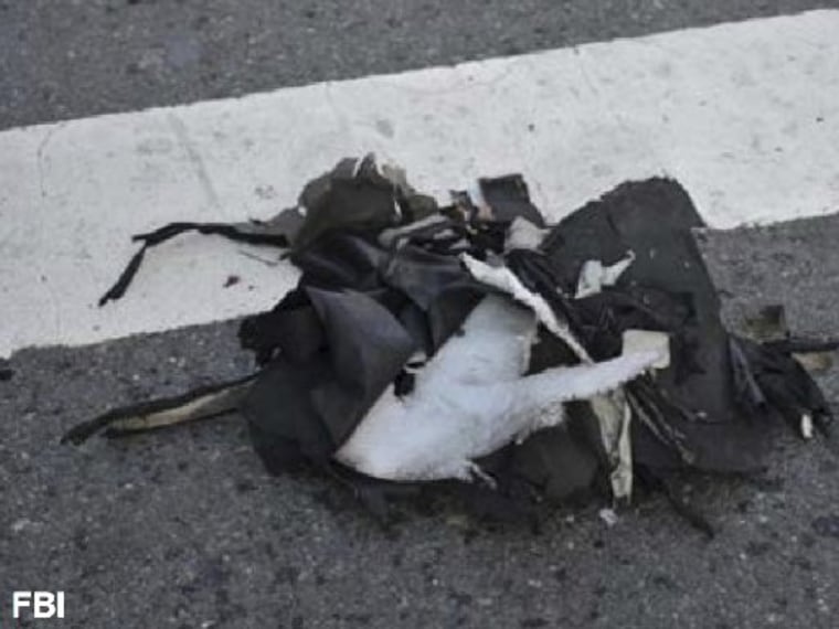 This image from a Federal Bureau of Investigation and Department of Homeland Security joint bulletin issued to law enforcement and obtained by The Associated Press, shows the remains of a black backpack that the FBI says contained one of the bombs that...