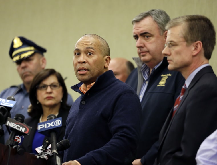 Massachusetts Gov. Deval Patrick speaks as Boston Police Commissioner Ed Davis, middle, and FBI Special Agent in Charge Richard DesLauriers, far right, listen at a news conference in Boston Monday, April 15, 2013 regarding two bombs which exploded in...