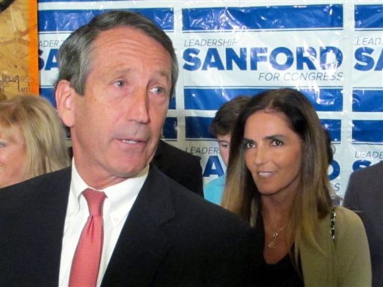 Former South Carolina Gov. Mark Sanford, with his fiancee Maria Belen Chapur. (AP Photo/Bruce Smith)