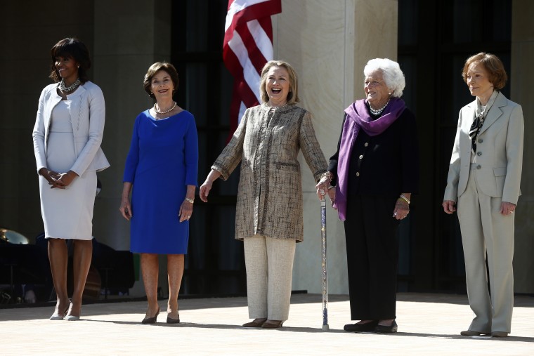 First lady Michelle Obama, left, stands with, from second from left, former first ladies: Laura Bush; Hillary Rodham Clinton; Barbara Bush; and Rosalynn Carter; at the dedication of the George W. Bush presidential library on the campus of Southern...