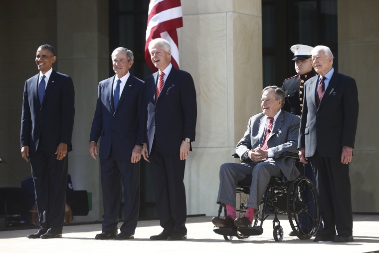 President Barack Obama stands with former presidents George W. Bush, Bill Clinton, George H.W. Bush, and Jimmy Carter at the dedication of the George W. Bush presidential library on the campus of Southern Methodist University in Dallas, Thursday, April...