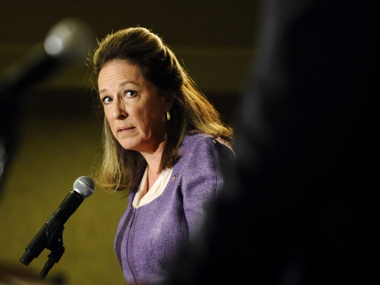 Democratic candidate Elizabeth Colbert Busch, left, looks at former South Carolina Gov. Mark Sanford as she answers a question during the 1st Congressional District debate on Monday, April 29, 2013 in Charleston S.C. (AP Photo/Rainier Ehrhardt)
