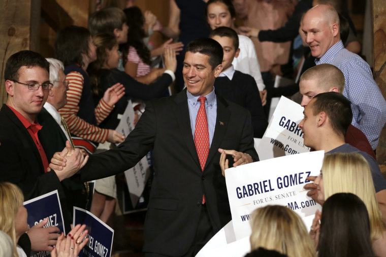 Republican candidate for the U.S. Senate, Gabriel Gomez, center, celebrates with supporters as he makes his way to the stage to address an audience with a victory speech at a watch party, in Cohasset, Mass. (AP Photo by Steven Senne/AP)