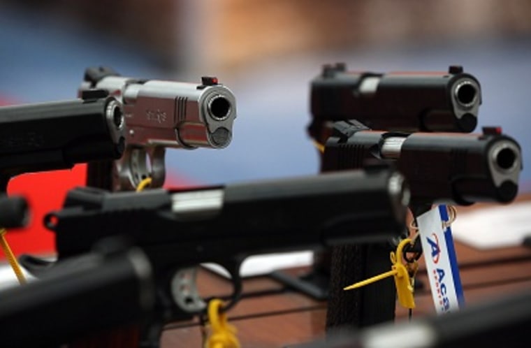 Handguns on display during the 2013 NRA Annual Meeting on May 5, 2013 in Houston, Texas. (Photo by Justin Sullivan/Getty Images)