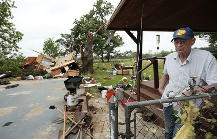 SHAWNEE, OK - MAY 20:  Lonnie Langston talks about his garage that was swept off the concrete pad next to his house by a tornado May 20, 2013 near Shawnee, Oklahoma. A series of tornados moved across central Oklahoma May 19, killing two people and...