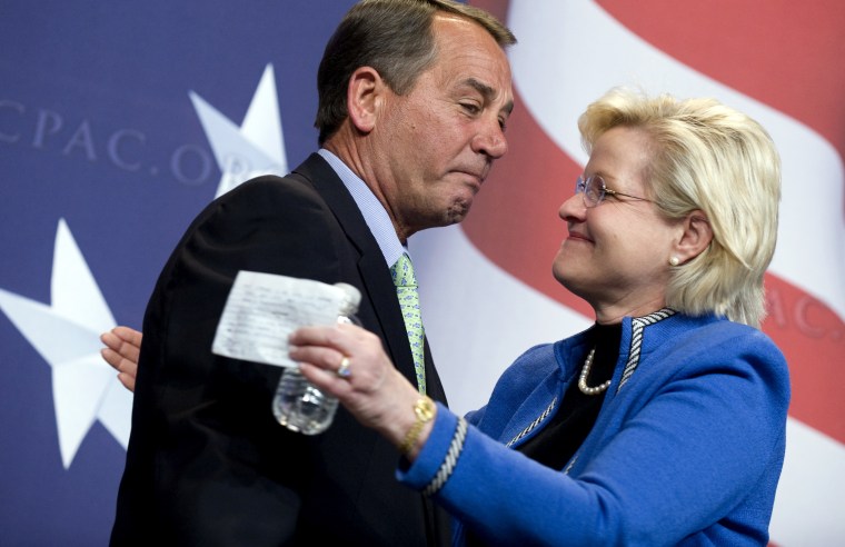 Cleta Mitchell of American Conservative Union, hugs House Minority Leader John Boehner, R-Ohio, before he addressed the Conservative Political Action Conference (CPAC) held at the Marriott Wardman Park hotel, Feb. 18, 2010.