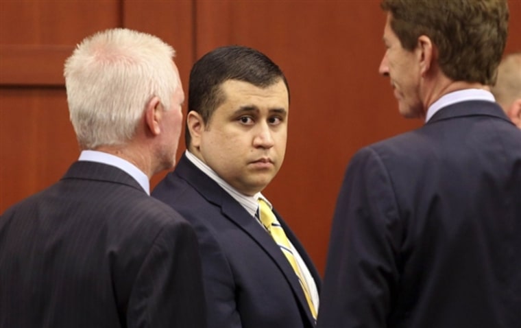 George Zimmerman stands in Seminole circuit court in Sanford, Fla., with his attorney Mark O'Mara, right, for a pre-trial hearing on April 30. (Joe Burbank / Pool via Reuters file)