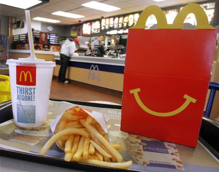 In this Jan. 20, 2012 photo, a Happy Meal box with French fries and a drink are posed at McDonald's in Springfield, Ill. (AP Photo/Seth Perlman)