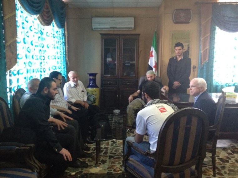 Sen. John McCain visits Syrian rebel leaders Monday. (photo: Syrian Emergency Task Force via @lizobagy)