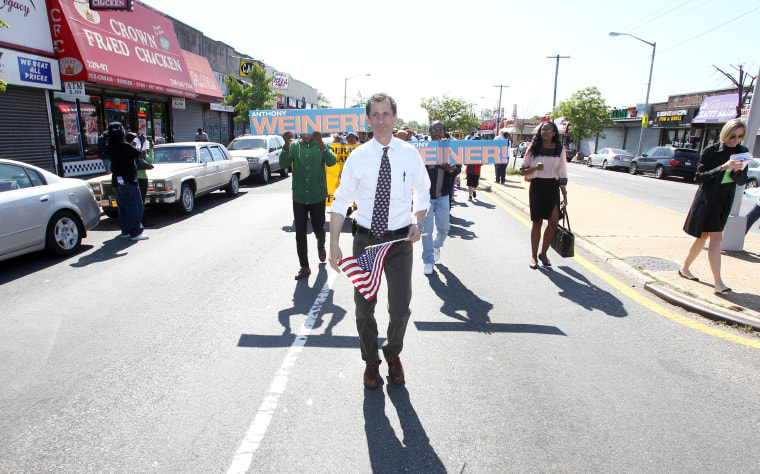 Anthony Weiner center, marches in the 24th Annual Laurelton Memorial Day Parade on Monday, May 27, 2013 in Queens, New York. (AP Photo/ Donald Traill)