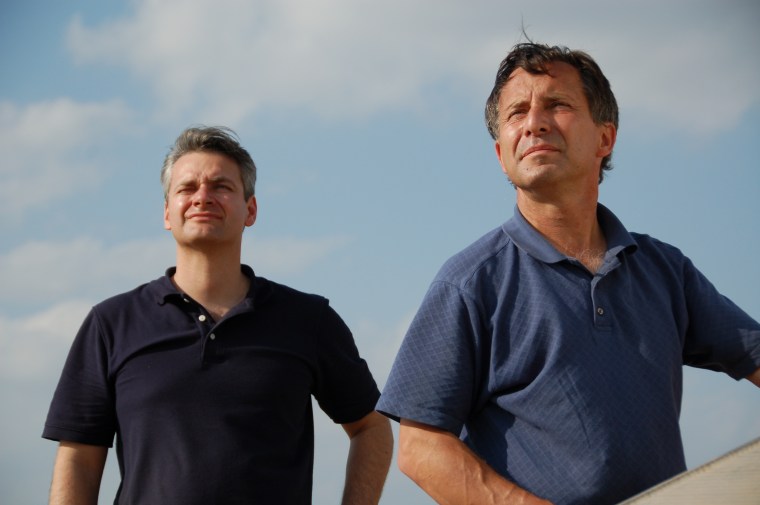 This undated photo provided by The Discovery Channel shows Carl Young and Tim Samaras watching the sky. Jim Samaras said Sunday, June 2, 2013, that his brother storm chaser Tim Samaras was killed along with Tims son, Paul Samaras, and another chaser,...