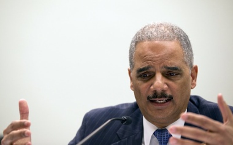 Attorney General Eric Holder testifies on Capitol Hill in Washington, Wednesday, May 15, 2013, before the House Judiciary Committee oversight hearing on the Justice Department. (Photo by Carolyn Kaster/AP)