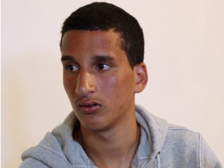 Salaheddin Barhoum sits in his apartment in Revere, Mass. on April 18, 2013. The high school student told The Associated Press he was scared to go outside because he worries people will blame him for the attack. (Photo by Rodrique Ngowi/AP)