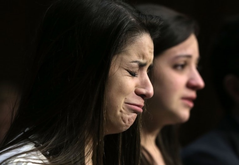 WASHINGTON, DC - FEBRUARY 27:  Sisters of Sandy Hook Elementary shooting victim first-grade teacher Victoria Soto, Jillian Soto (R) and Carlee Soto (L) listen during a hearing before the Senate Judiciary Committee February 27, 2013 in Washington, DC.  ...