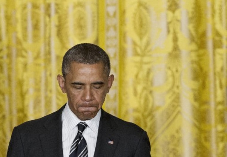 US President Barack Obama speaks during a LGBT (the lesbian, gay, bisexual, and transgender community) Pride Month celebration in the East Room of the White House in Washington, DC, on June 13, 2013. \"We're reaching a turning point,\" he said. AFP PHOTO...