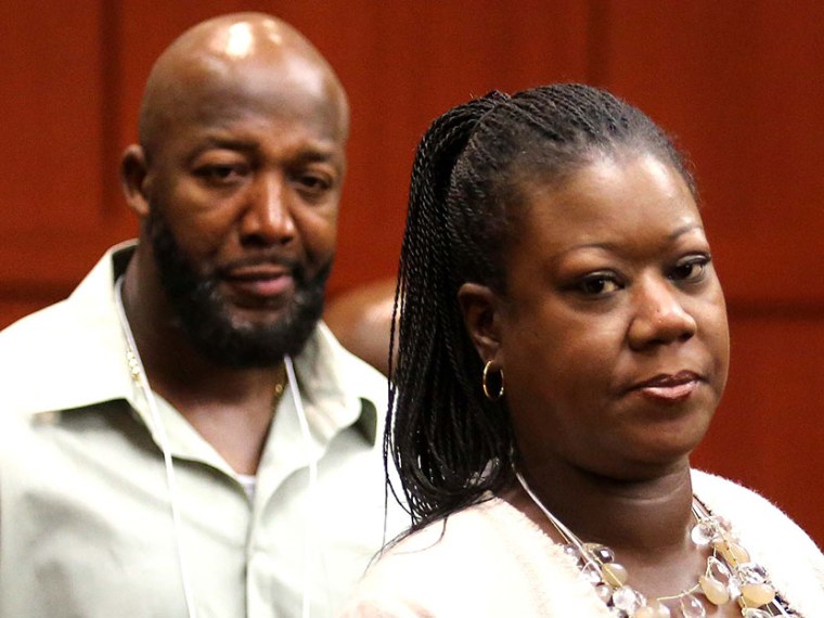 Sybrina Fulton, right, and Tracy Martin, parents of slain teen Trayvon Martin, arrive in Seminole circuit court for the George Zimmerman trial in Sanford, Fla., Monday, June 17, 2013.(Photo by Joe Burbank/Orlando Sentinel/AP)