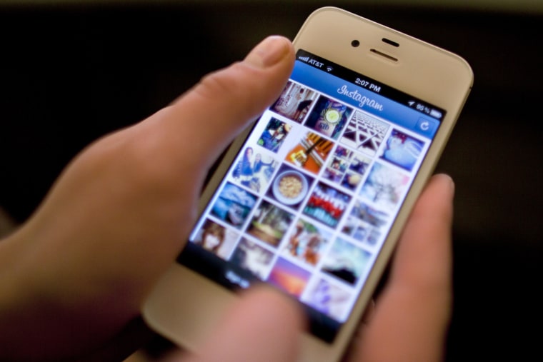 Instagram is demonstrated on an iPhone Monday, April 9, 2012, in New York. Facebook is spending $1 billion to buy the photo-sharing company Instagram in the social network's largest acquisition ever. Instagram lets people apply filters to photos they...
