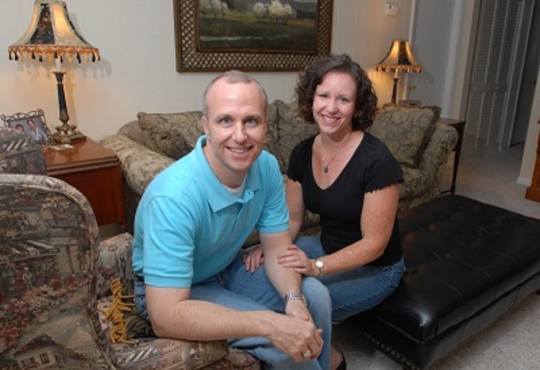 In this Thursday, May 11, 2006 file photo, Alan Chambers, president of Exodus International, sits with his wife, Leslie, in their home in Winter Park, Fla. (Photo by Phelan M. Ebenhack/AP)