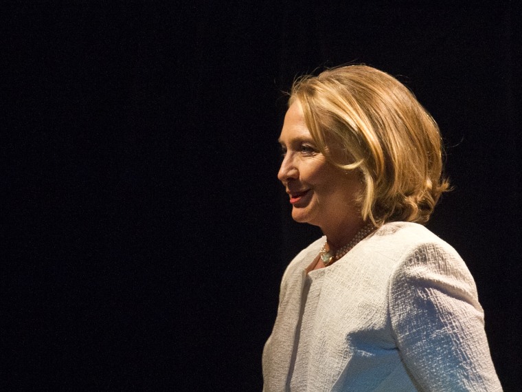 Former U.S. Sec. of State Hillary Clinton arrives on stage to address the Vital Voices Global Awards ceremony at the Kennedy Center in Washington on April 2, 2013. She will be a Democratic party nominee in 2016, David Axelrod said. (Photo by Nicholas...