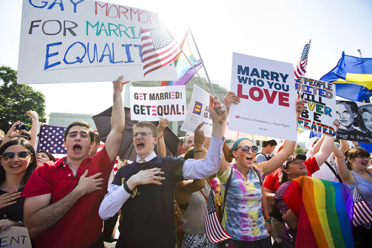 Gay rights supporters gather outside the Supreme Court just before it ruled that the Defense of Marriage Act (DOMA), which prevents the federal government from recognizing same-sex marriage, is unconstitutional in Washington, DC, USA, 26 June 2013. ...
