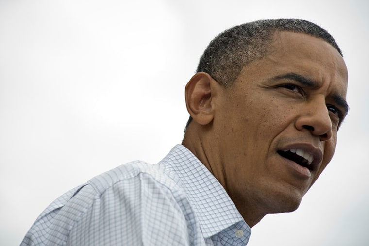 President Barack Obama delivers remarks during a campaign event in Davenport, Iowa on August 15, 2012, during President Obama's three-day campaign bus tour across the state. (Photo by Charles Ommanney/Getty Images)