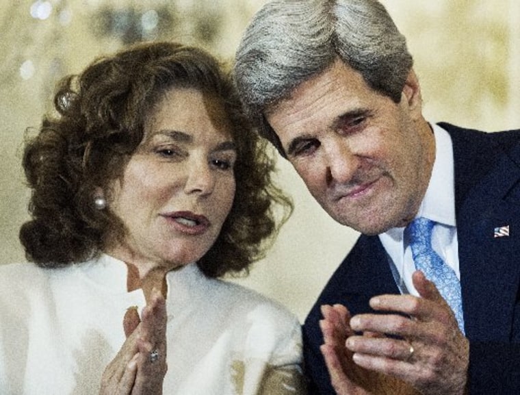 This February 6, 2013 file photo shows Teresa Heinz Kerry (L) and husband, US Secretary of State John Kerry, applauding during introductions at his ceremonial swearing-in event at the US Department of State in Washington, DC. The wife of US Secretary...