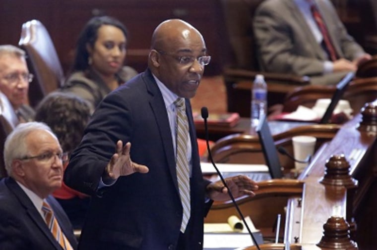 Illinois Sen. Kwame Raoul, D-Chicago, argues concealed carry gun legislation while on the Senate floor during session at the Illinois State Capitol Tuesday, July 9, 2013, in Springfield, Ill. Illinois became the last state in the nation to allow public...