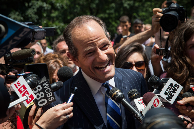 NEW YORK, NY - JULY 08:  Former New York Gov. Eliot Spitzer is mobbed by reporters while attempting to collect signatures to run for comptroller of New York City on July 8, 2013 in New York City. (Photo by Andrew Burton/Getty Images) *** BESTPIX ***