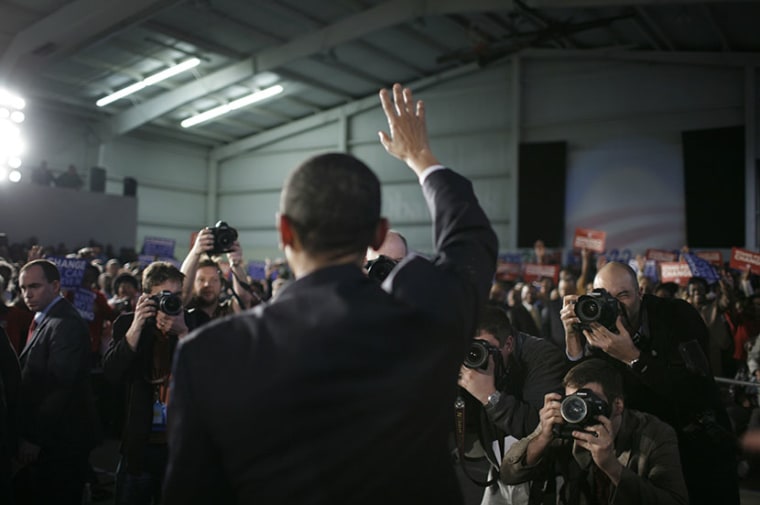 Media swarm around President Barack Obama  (Photo by Charles Ommanney/Getty Images)
