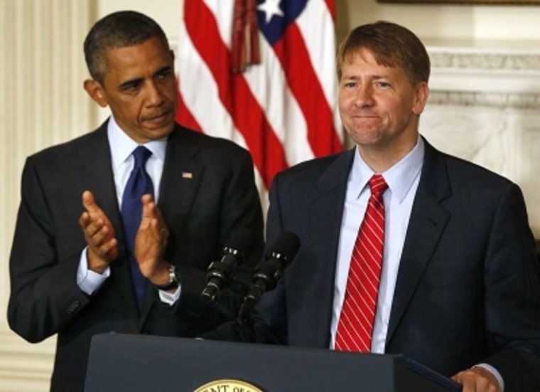 President Barack Obama stands next to the new Director of the Consumer Financial Protection Bureau Richard Cordray at the White House, July 17, 2013. (Photo by Larry Downing/Reuters)