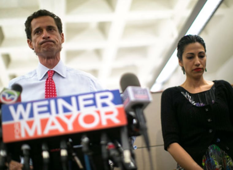 New York mayoral candidate Anthony Weiner and his wife Huma Abedin attend a news conference in New York on July 23, 2013. (Photo by Eric Thayer/Reuters)