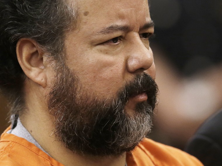 Ariel Castro stands before a judge during his arraignment on an expanded 977-count indictment Wednesday, July 17, 2013, in Cleveland.  (Photo by Tony Dejak/AP)