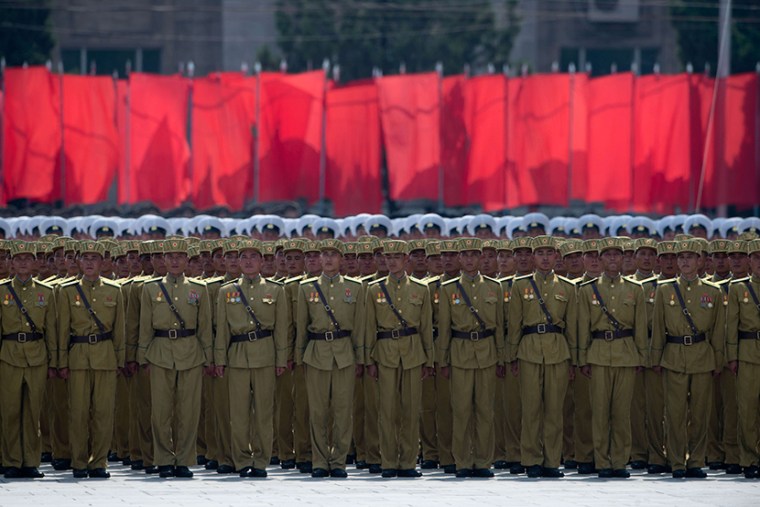 North Korean soldiers stand in formation as they take part in a military parade past Kim Il-Sung square marking the 60th anniversary of the Korean war armistice in Pyongyang on July 27, 2013. (Photo by Ed JonesEd Jones/AFP/Getty)