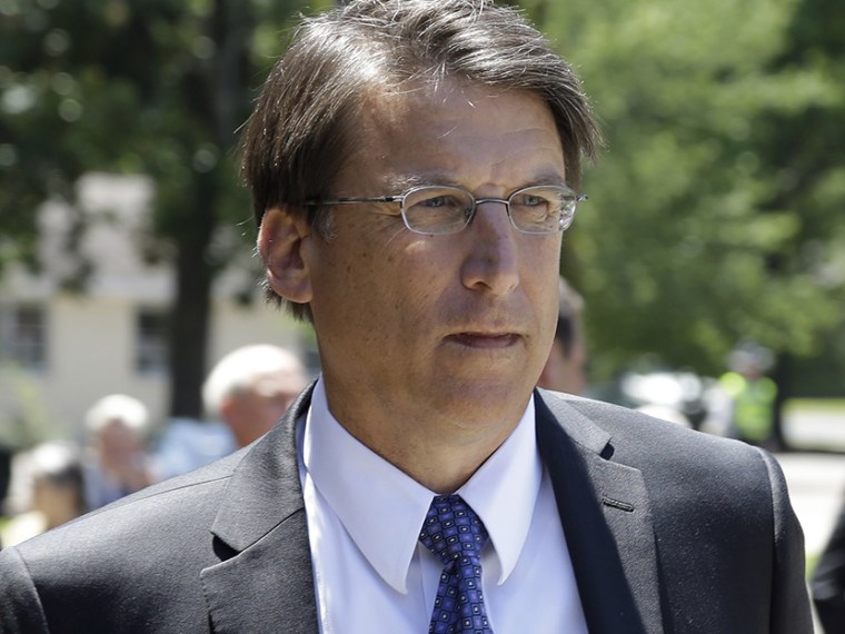 North Carolina Gov. Pat McCrory arrives for a memorial service for former North Carolina Gov. James Holshouser at Brownson Memorial Presbyterian Church in Southern Pines, N.C., Friday, June 21, 2013.  (Photo Gerry BroomePool/AP)