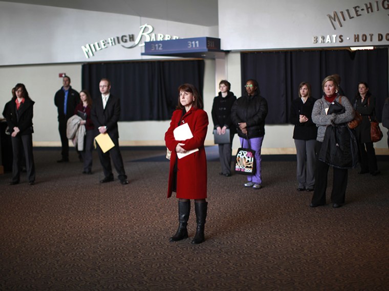 Job seekers listen to a presentation at the Colorado Hospital Association health care career fair in Denver April 9, 2013. (Photo by Rick Wilking/Reuters)