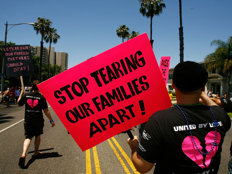 File Photo: A group that wants immigration reform for gay partners marches in the Pride Parade at the conclusion of the two-day 25th annual Long Beach Lesbian and Gay Pride Festival and Celebration on May 18, 2008 in Long Beach, California. (Photo by...
