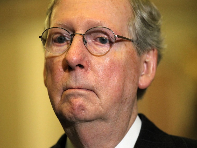 File Photo:  U.S. Senate Minority Leader Sen. Mitch McConnell (R-KY) listens during a news briefing after the weekly Senate Republican Policy Luncheon December 11, 2012 on Capitol Hill in Washington, DC. McConnell discussed various topics with the...