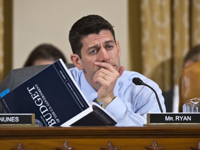 House Budget Committee Chairman Rep. Paul Ryan, R-Wis., a member of the House Ways and Means Committee, holds a copy of President Barack Obama's fiscal 2014 budget proposal book as he questions Health and Human Services (HHS) Secretary Kathleen...