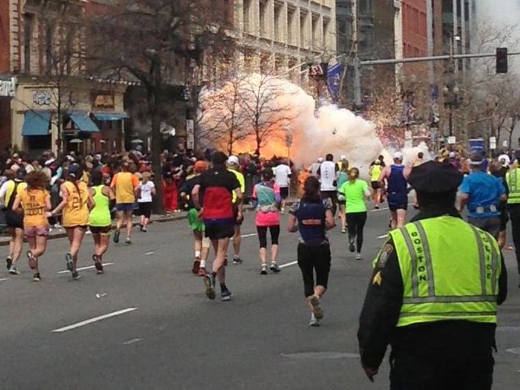 Explosion at the 117th Boston Marathon, Boston, 15 Apr 2013. (Photo by Rex Features via AP Images)