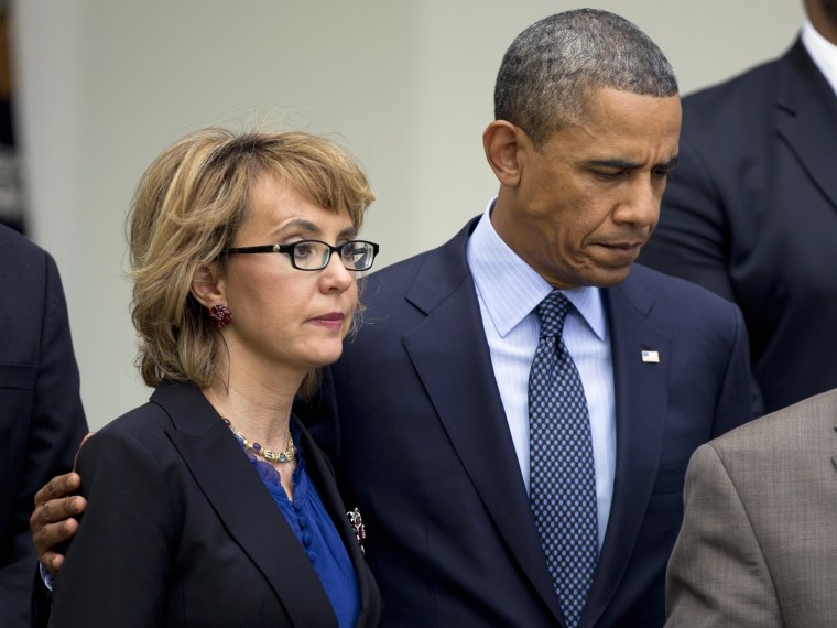 President Barack Obama with former Rep. Gabrielle Giffords in the Rose Garden at the White House in Washington, Wednesday, April 17, 2013, about measures to reduce gun violence.  (Photo by Manuel Balce Ceneta/AP Photo)