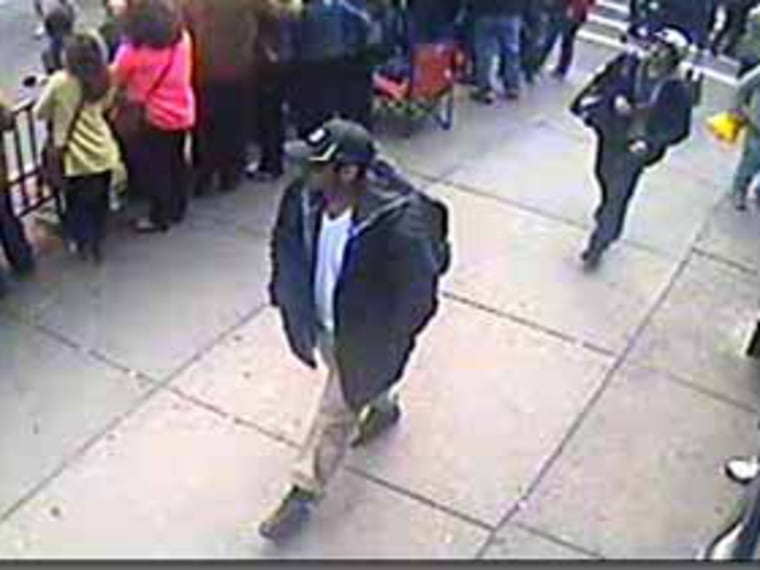 Photos of individuals the FBI considers suspects in the Boston bombings. (Credit: FBI handout)